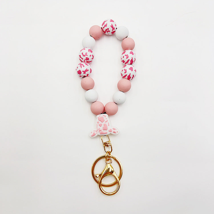Wholesale Silicone Pumpkin Cow Ghost Dog Paw Wooden Bead Bracelet Keychain